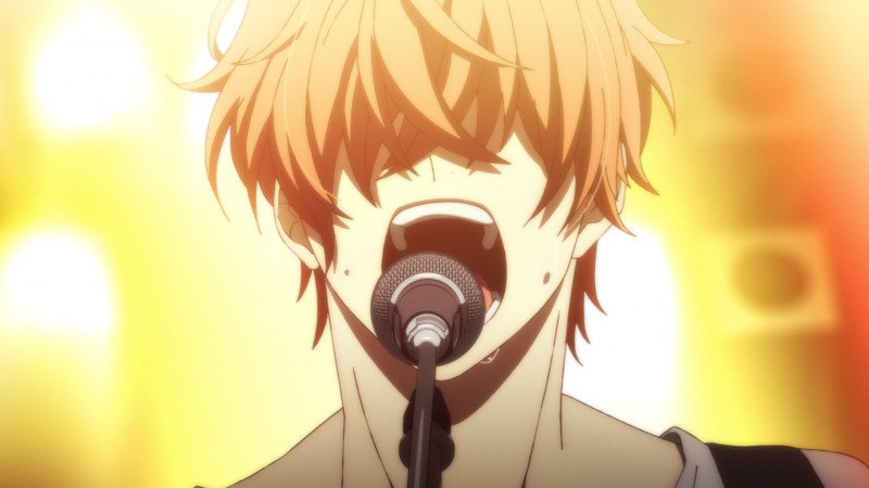 Mafuyu singt emotional mit seiner Gitarre in einer Szene aus dem Romance Anime Given Mafuyu singt emotional mit seiner Gitarre in einer Szene aus dem Romance Anime Given